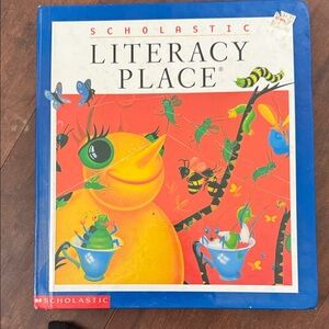 Scholastic Literacy Place with Vibrant Red and Blue Cover